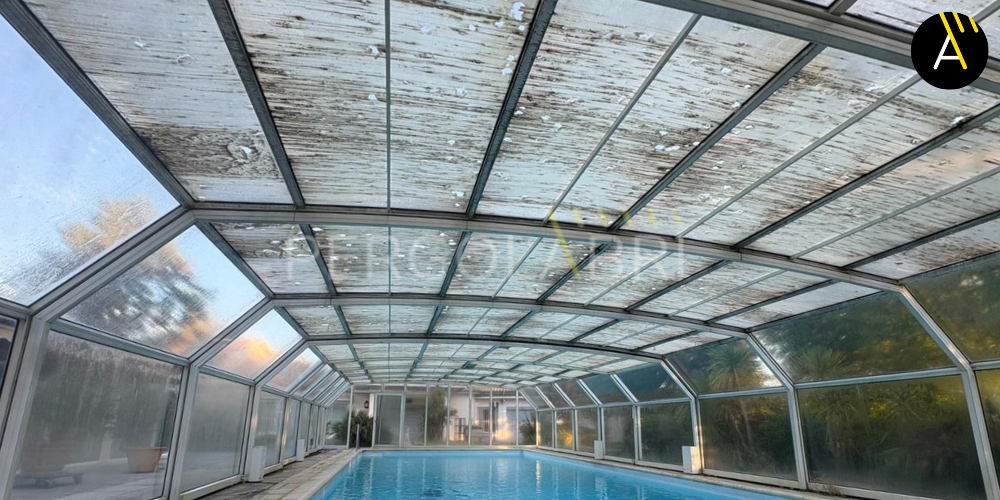 Pergolabri : toiture d'un abri de piscine haut à remplacer