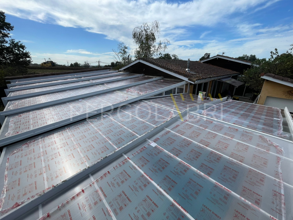 Découpe et pose des nouvelles plaques de polycarbonate